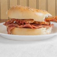 Meat Lovers · With bacon, pork roll, sausage and cheese.