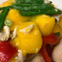 Mango Chicken · Chicken with mango, pea shoots, red pepper in sweet white sauce.