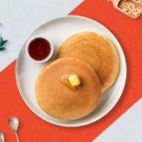 Classic Pancakes With Eggs & Bacon · Fluffy pancakes cooked with care and love topped with butter and maple syrup. Served with a ...