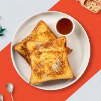 French Factor Toast · Fresh bread battered in egg, milk, and cinnamon cooked until spongy and golden brown. Topped...