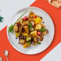 Fried Potatoes On Me · Idaho potatoes cut into cubes and stir fried.