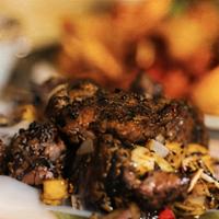 Truffle Beef Tenderloin · 🌶️🌶️    diced beef tenderloin with black truffle oil and house secret chili sauce, shallot...