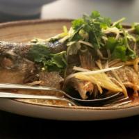 Steamed Whole Bass · steamed whole bass with ginger and scallion 清蒸鲈鱼. (the Entrée do not come with rice.)