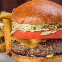 Prime Cheeseburger · Tillamook Cheddar, Caramelized Onions, Lettuce, Tomato, Mayo, Pickle Relish