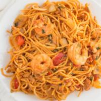 Creole Chicken & Shrimp Pasta · Sautéed chicken, shrimp red bell peppers, and onions, tossed in creole sauce.