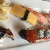 Sushi Appetizer · Four pieces of chef's choice sushi.