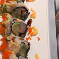 Ichiban Roll · Eel, shrimp, avocado, and kani wrapped inside, topped with fried white fish, scallion, and s...