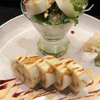 Rocky Roll · Tempura lobster, avocado, and kani wrapped with cucumber and served with eel sauce and spicy...