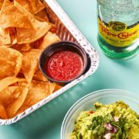 Guacamole And Chips · Crispy and crunchy homemade corn tortilla chips served with a heaping serving of our freshly...