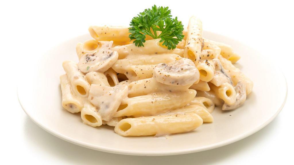 Penne Carbonara · Crispy bacon, sweet peas, mushrooms, and creamy alfredo sauce on a bed of penne pasta.