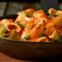 Penne Primavera · Sauteed onions, peppers, broccoli, mushrooms, and spinach on a chefs special garlic sauce on...