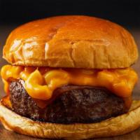 The Mac Burger · Beef patty, melted cheddar cheese, and macaroni and cheese on a regular bun.