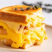 Egg & Cheese Sandwich  · Creamy Cheese and egg on a sandwich.