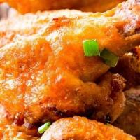 Chicken Wings · 6 pieces. Choice of BBQ, Buffalo, or Plain Wings. Served with a side of Ranch Dressing & Car...