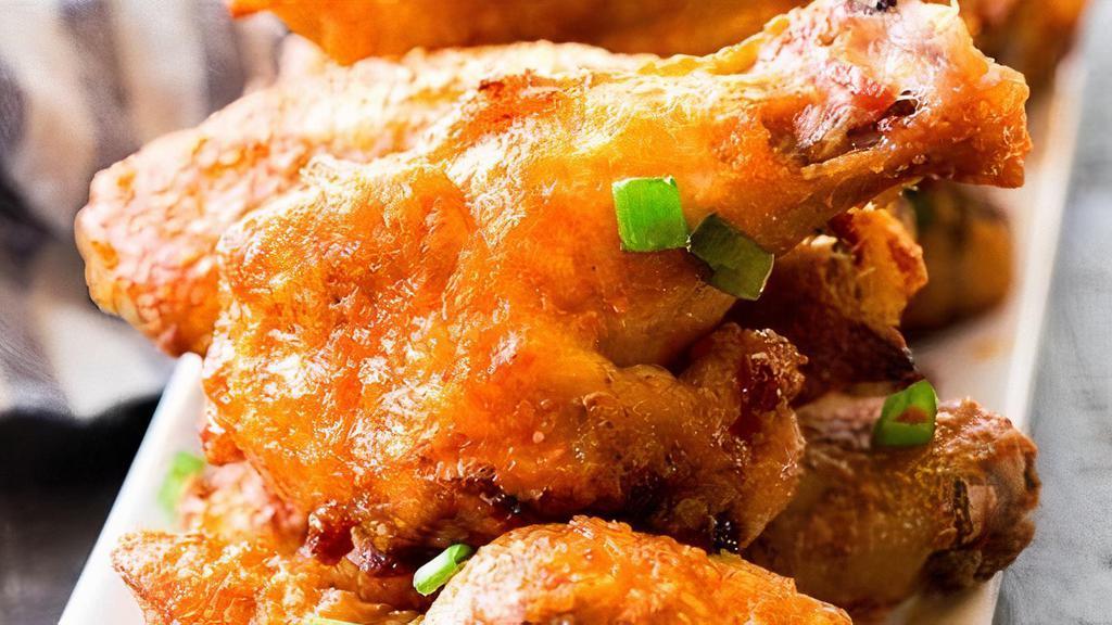 Chicken Wings · 6 pieces. Choice of BBQ, Buffalo, or Plain Wings. Served with a side of Ranch Dressing & Carrots.
