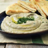 Baba Ghanoush App · Puree made from roasted eggplant served with Fresh pita bread.