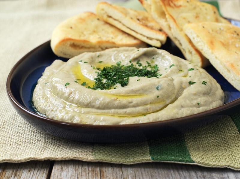 Baba Ghanoush App · Puree made from roasted eggplant served with Fresh pita bread.