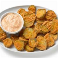 Fried Pickles App · Pickle chips served with a side of Chipotle Mayo Sauce.