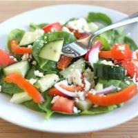 Spinach Salad · Popeyes salad of choice, A bed of crisp organic spinach with tomatoes, red onions, feta chee...