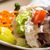 Classic Gyro Pita · Lamb & beef mixture with lettuce, tomatoes, onions & our homemade organic tzatziki sauce