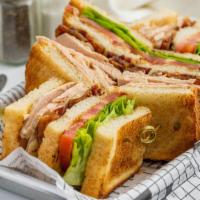 Turkey Club · Oven roasted turkey, bacon, lettuce, tomato, mayo. Add addons for an additional charge.