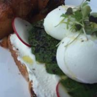 Avocado Toast · Poached egg, blackened avocado, ricotta cheese, radishes, microgreens, and whole grain bread.