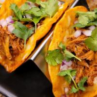 Birria Tacos (3 Tacos Per Order) · Birria dipped tortilla, choice of protein braised with smoked Mexican pepper and spices, mel...