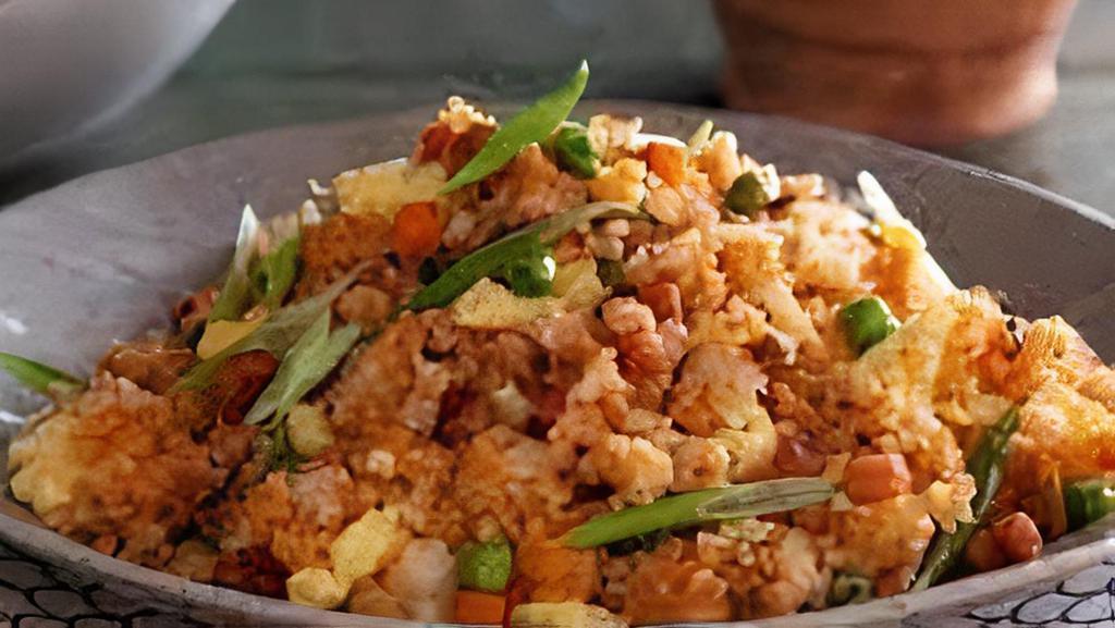 Wham! Spicy Fried Rice · Spicy fried rice,  chicken,  egg,basil,carrots, onions,bell peppers.