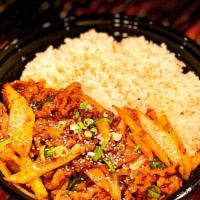 Jeyuk Rice Platter · SPICY STIR-FRIED PORK WITH ONIONS AND SCALLIONS OVER A BED OF RICE