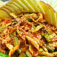 Golbangi & Somyun · Chilled bai top shells salad and noodles with spicy sauce.