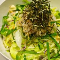 Hanchi Hoe Muchim · Raw squid salad with spicy sauce