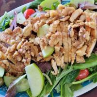 Apple Walnut Salad · Grilled Chicken, Granny Smith Apples, Feta Cheese, Walnuts, Dried Cranberries over Romaine