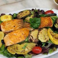 Salmon Salad · Mixed Greens, Grilled Salmon,  Zucchini, and Squash over Tossed Salad