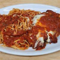 Eggplant Parm · Breaded and Fried in tomato Sauce and Topped with Melted Mozzarella. Served with Pasta or Sa...