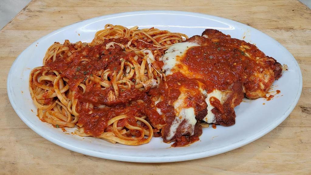 Eggplant Parm · Breaded and Fried in tomato Sauce and Topped with Melted Mozzarella. Served with Pasta or Sauteed Vegetable or Side Salad and Garlic Bread.