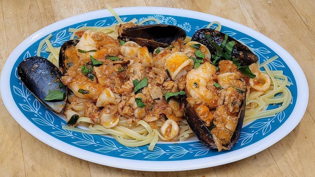 Seafood Combo · Assorted Clams, Mussels, Calamari and Shrimp in Marinara Sauce. Served with Pasta or Sauteed Vegetable or Side Salad and Garlic Bread