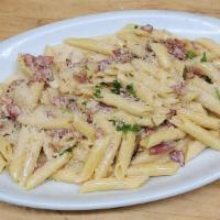 Carbonara Sauce · Bacon, Onions and Grated Cheese in Heavy Cream Sauce. Your Choice of Penne, Rigatoni, Spaghe...