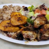 Jerk Chicken Meal · Jerk chicken, with your choice of rice and peas or white rice, fried plantains, and salad.