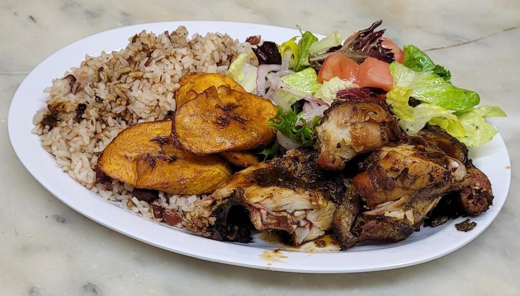 Jerk Chicken Meal · Jerk chicken, with your choice of rice and peas or white rice, fried plantains, and salad.