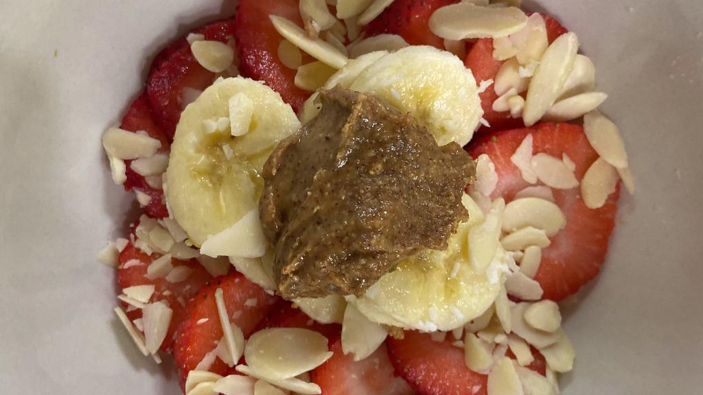 Nutty Professor · Gluten-free. Vegan. 100% organic acai, banana, blueberries, almond butter, almond milk. Toppings: banana slices, almonds, strawberries, peanut butter