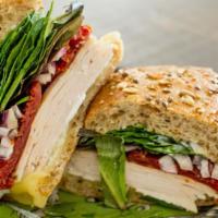 Perky Turkey · 100% organic. Roasted turkey slices, Swiss cheese, baby spinach and sun-dried tomato.