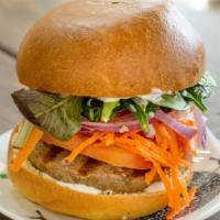 Turkey Burger · 100% organic. Locally farmed turkey, served on a bun with baby greens, sprouts, onions, toma...
