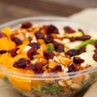 Clockwork Orange Quinoa Bowl  · Gluten-free. Vegan. 100% organic. Tricolor quinoa, kale, orange, almonds, marinated zucchini...