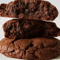 Triple Chocolate Walnut · Triple chocolate chip cookie made with chocolate dough, dark and milk chocolate chips, and w...