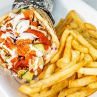 Gyro · Includes lettuce, tomato, onions, White sauce, hot sauce. Comes with fried fries and cola.
