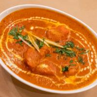 Murgh Makhani · Boneless tandoor-baked chicken, tomato-based sauce, powdered fenugreek leaf, butter.