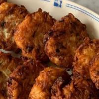 Potato Latkes · Pack of twelve. Russ and Daughters makes the best potato latkes by hand in small batches eve...