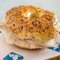 The Mensch · Sturgeon and cream cheese on a bagel or bialy. Sorry, no toasting.