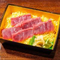 Maguro · Blue fin tuna marinated in dashi soy sauce.
