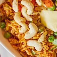Honest Sp. Pulav · Fresh vegetables and fluffy basmati rice sauteed with butter and garlic with our signature s...